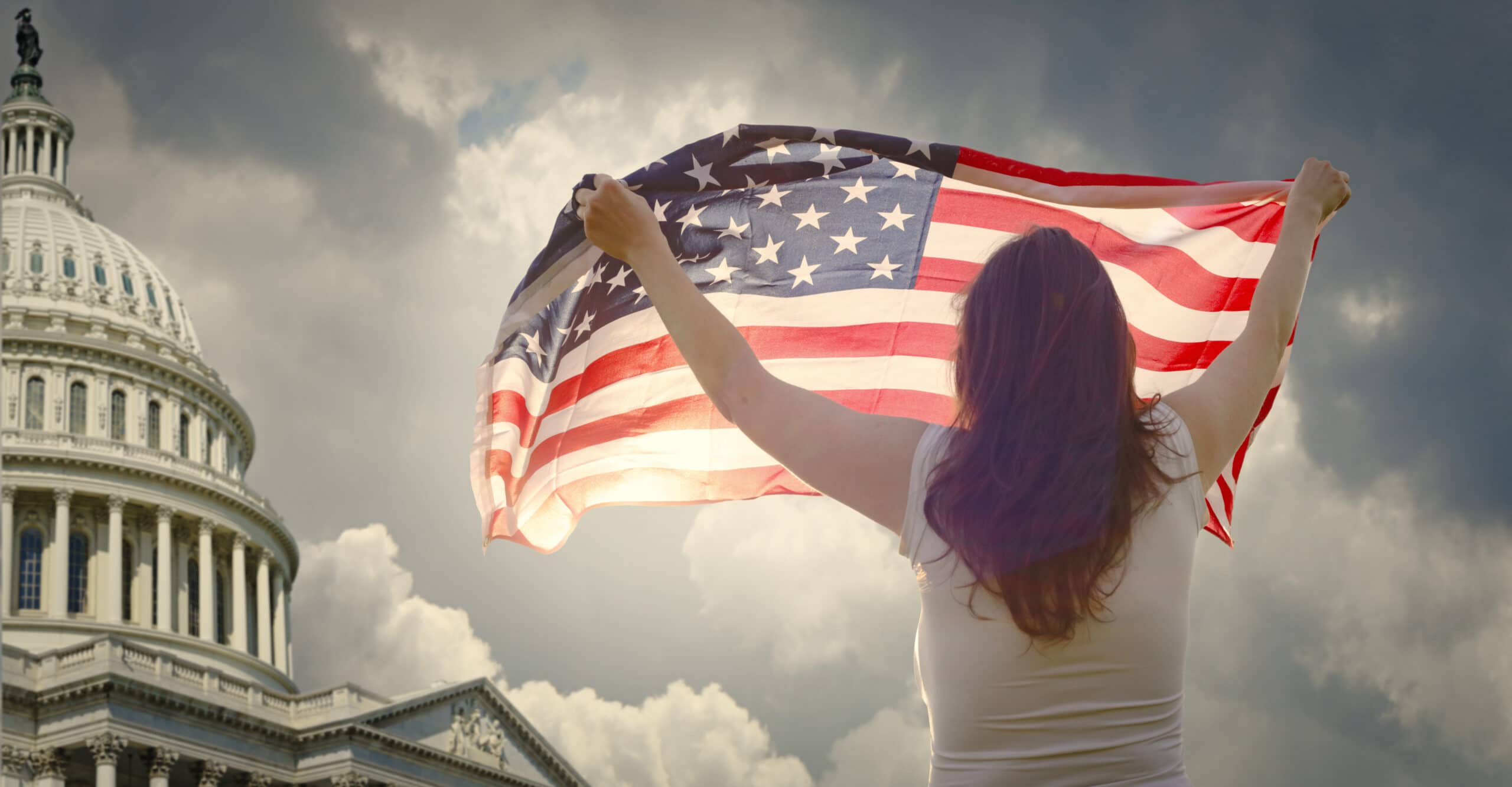 Girl with US flag at The Capitol